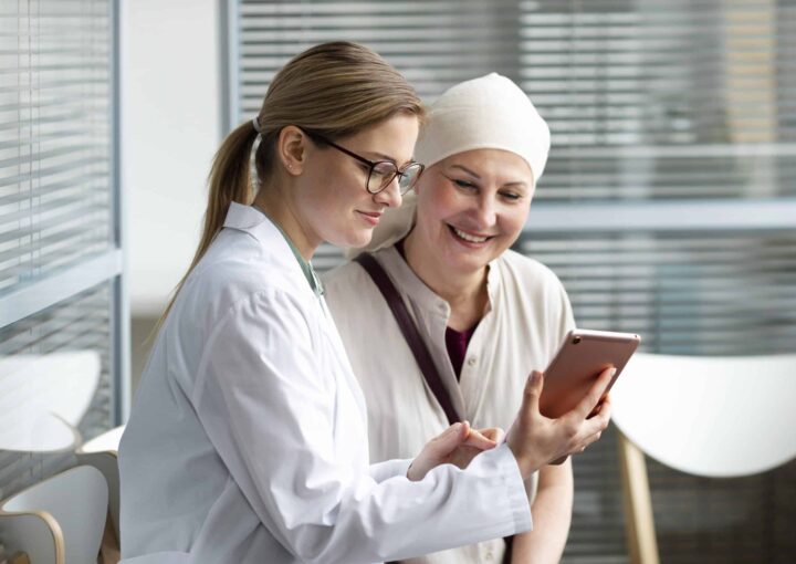 middle-aged-woman-with-skin-cancer-talking-with-her-doctor